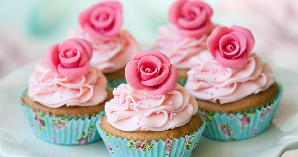 Vanilla velvet cupcakes with strawberry frosting.